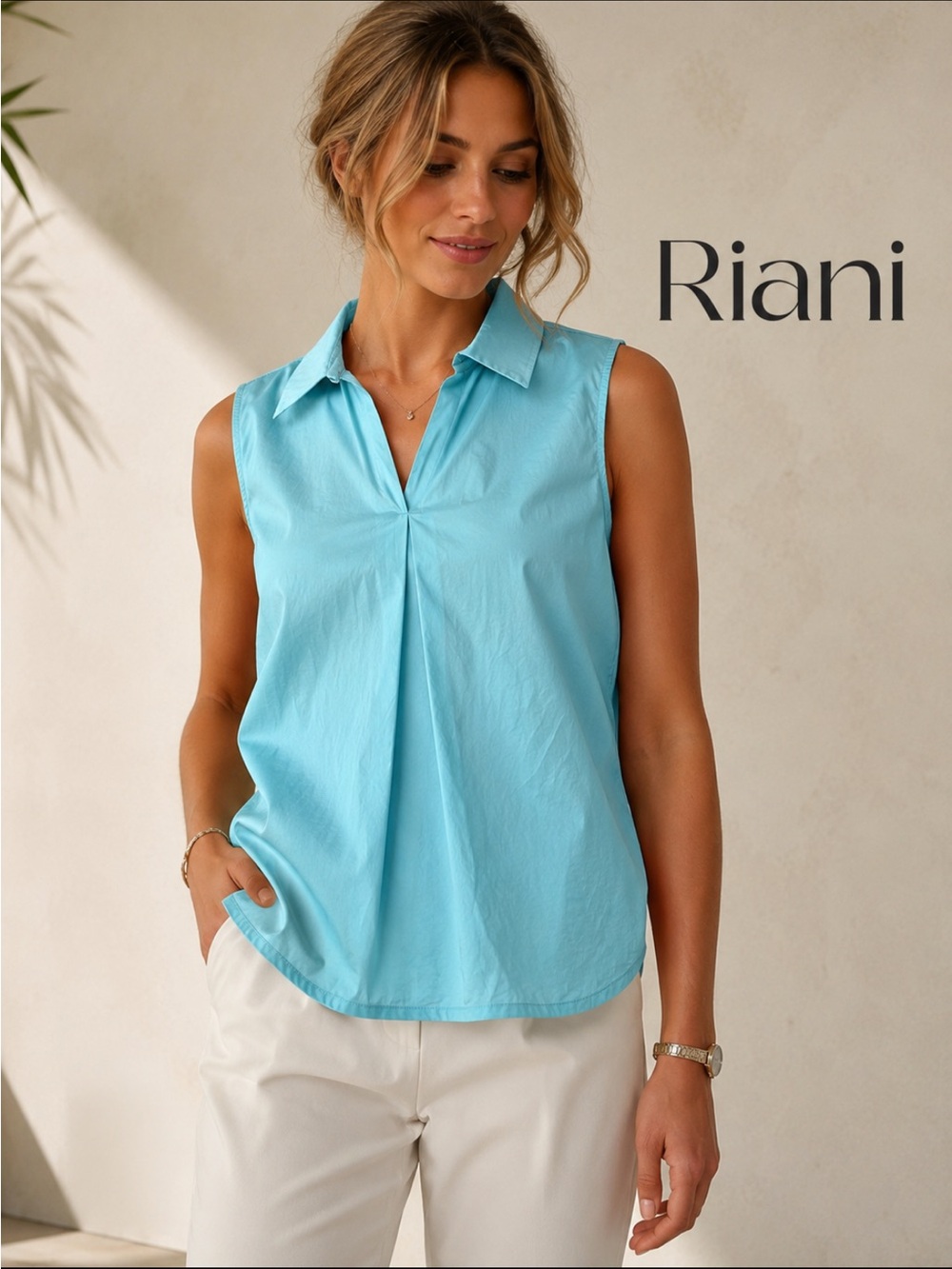 RIANI, sleeveless turquoise minimalist top!
